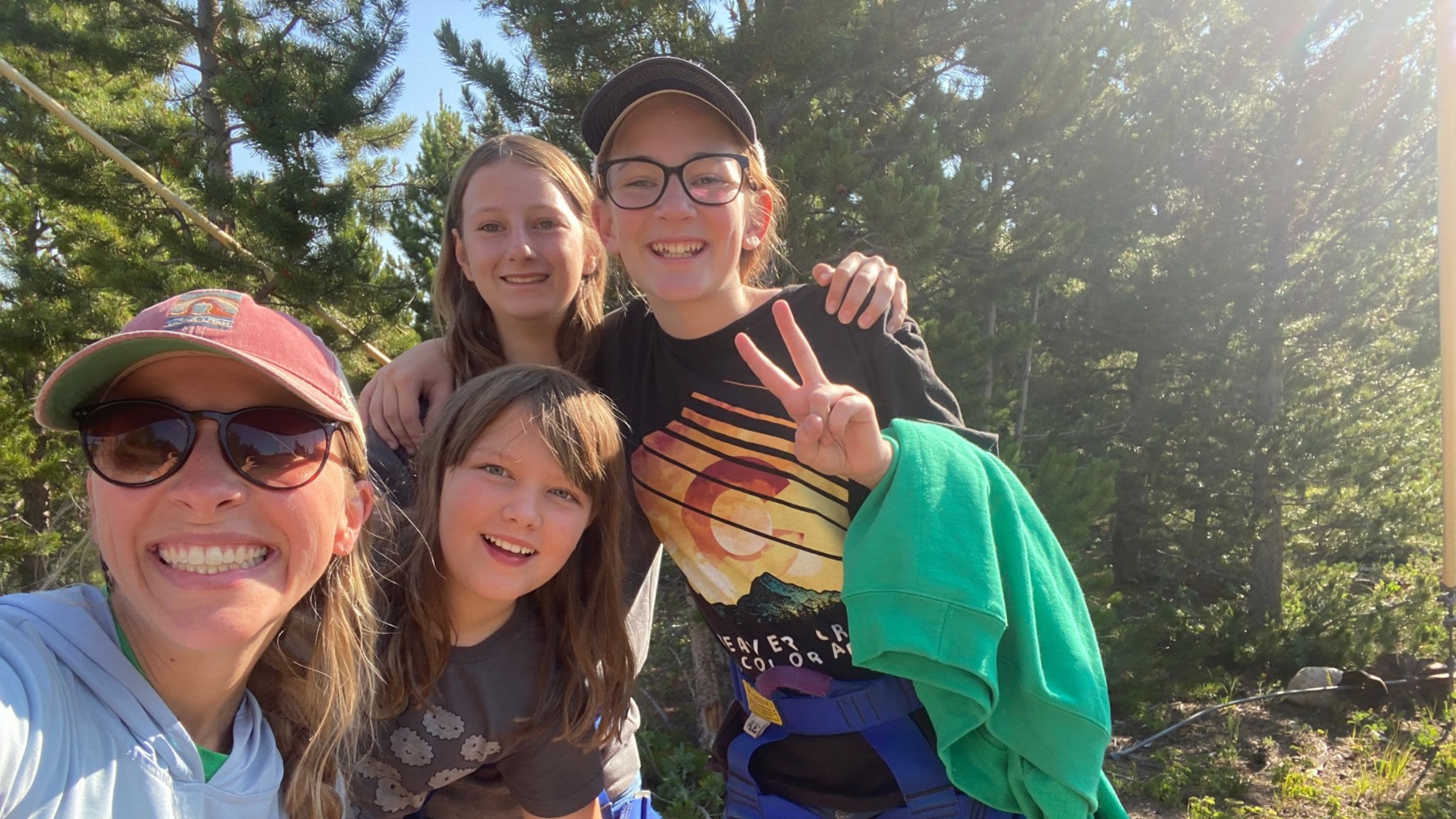 Participants in the Eco Explorers program posing in the great outdoors during one of their activities.