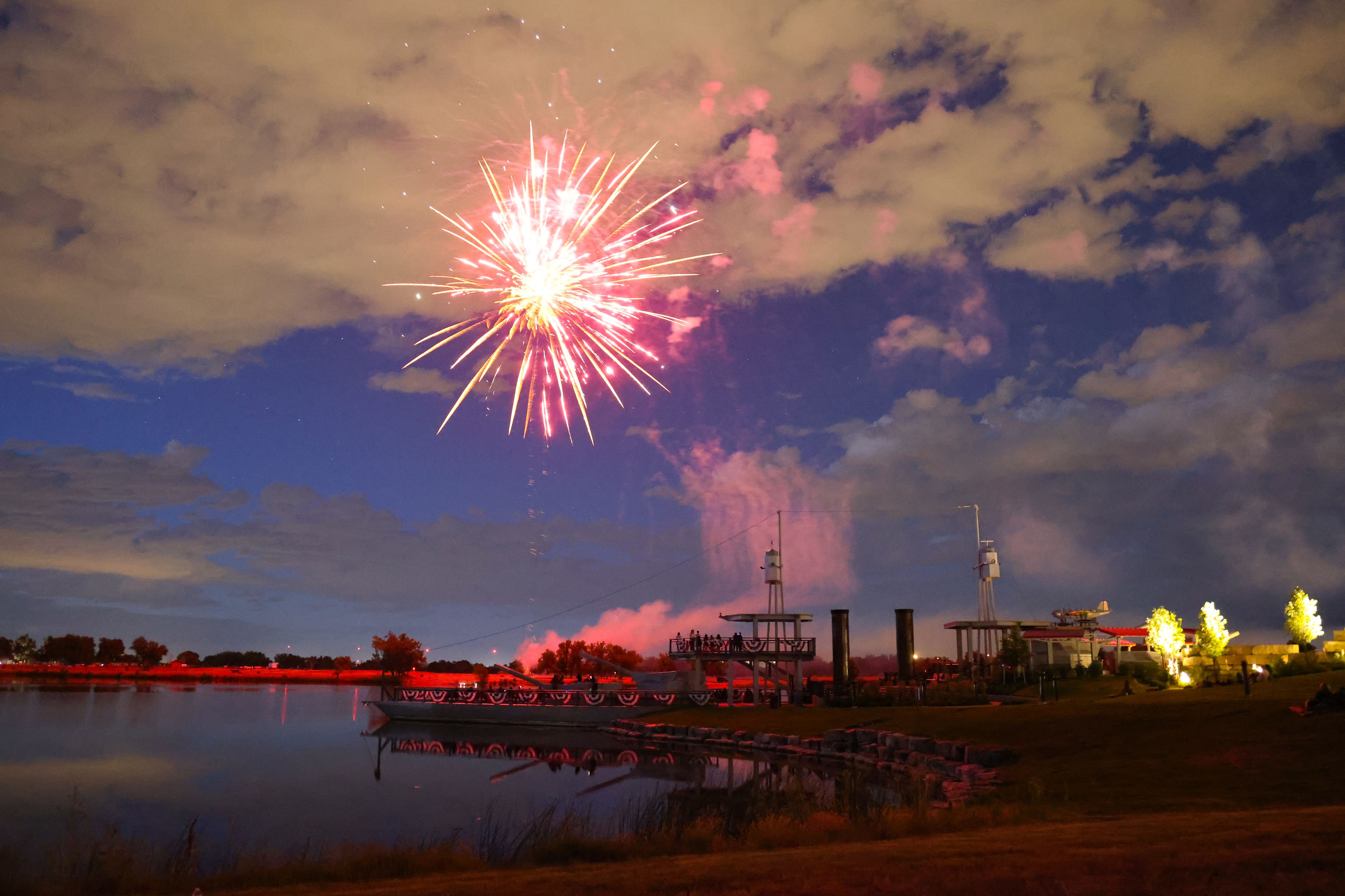 Fireworks exploding over the Adams County Veterans Memorial at Stars & Stripes.