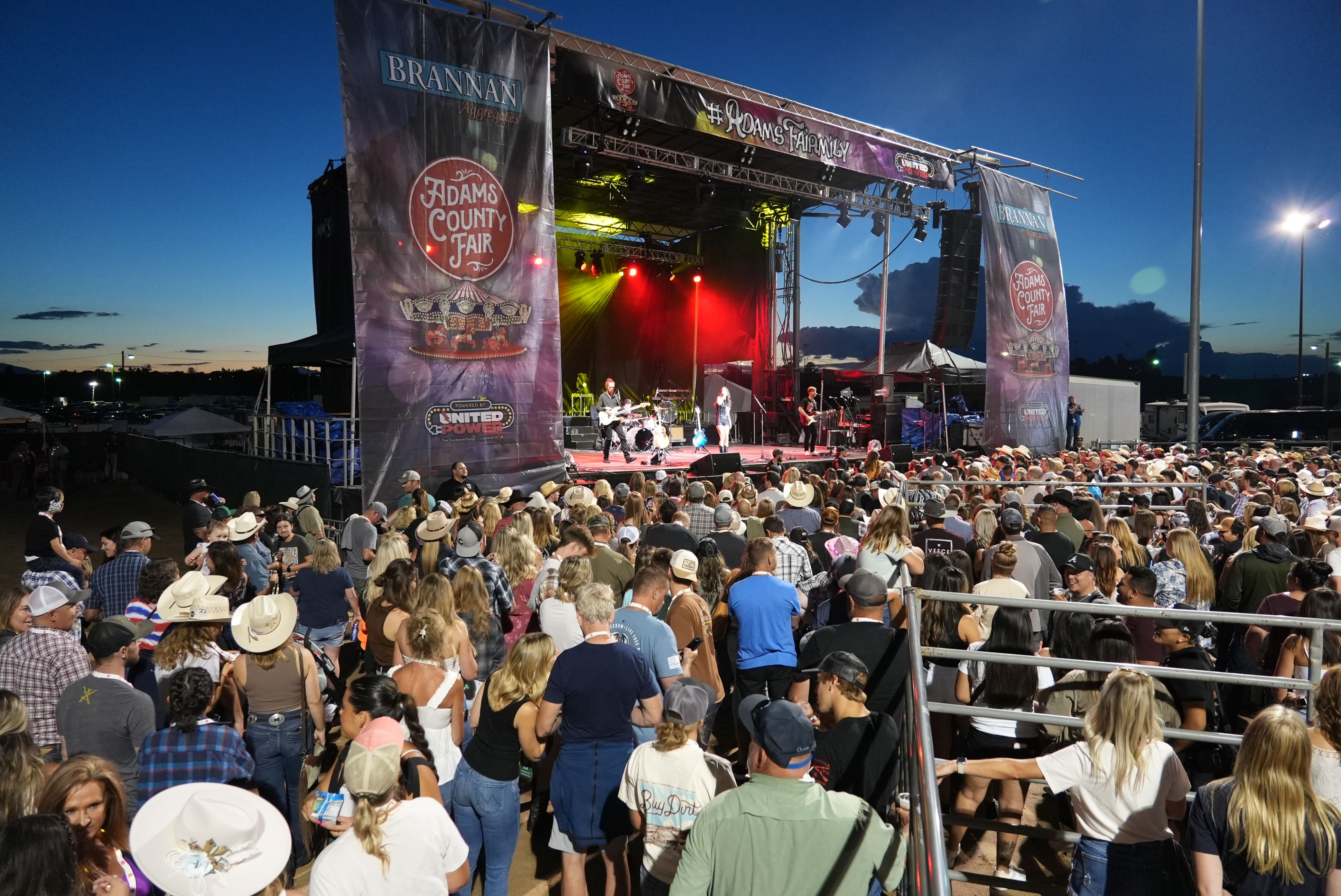 A large crowd gathers at one of the Adams County Fair grandstand events.